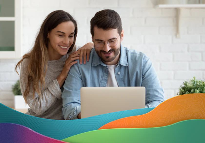 Young couple using laptop ACP page